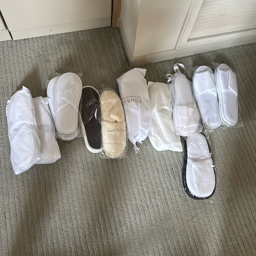 Sets of slippers -new never worn 
12 sets